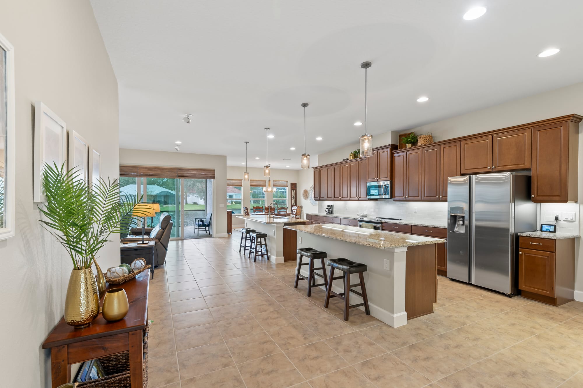 Casual Luxury Meets Lakeside Living in this 2019-built home in Grand Haven!